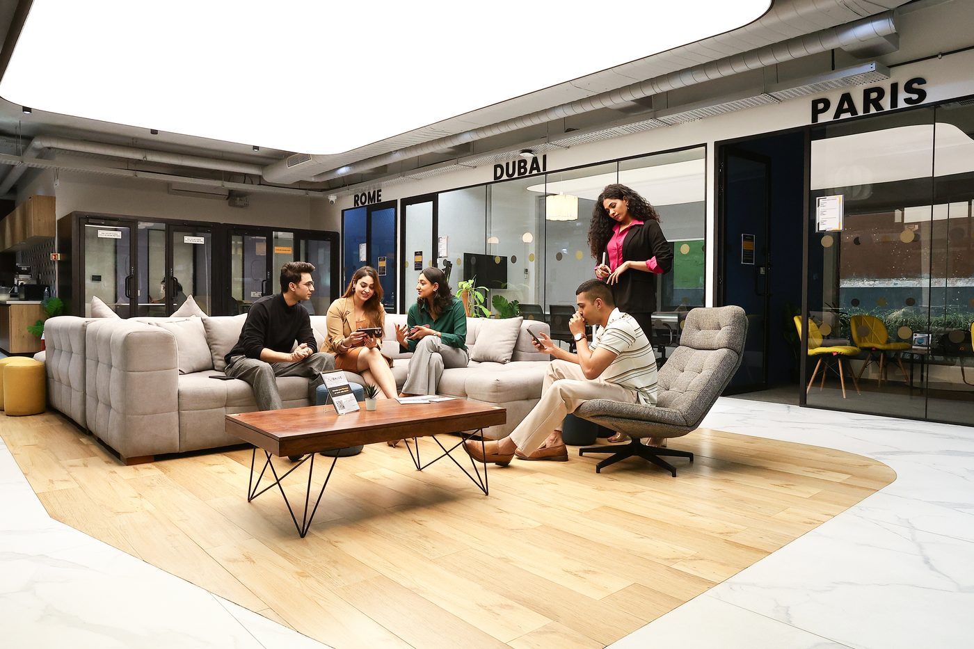 A themed BHIVE lounge with sofa seating